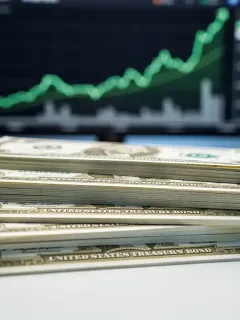 US Treasury bonds stacked, financial charts in background