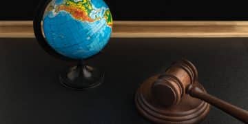 AI deepfake legislation: Wooden Judge gavel and globe.