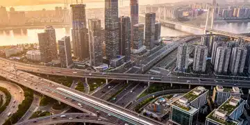 Modern urban infrastructure with highways and rail, representing the National Infrastructure Plan 2026